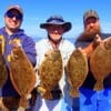 School Chums- Kevin and Kelly Kuropata and Mike Mathis of Houston took this 3 man limit of flounder on Berkley Gulp