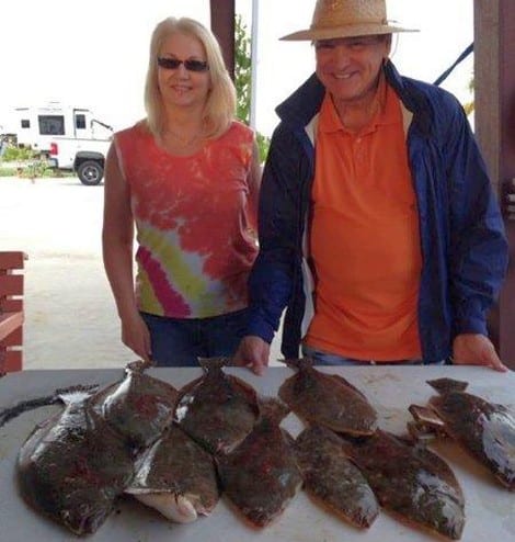 Debi and Bill are all smiles while showing off their mess of flatfish. These flounder were caught Saturday between 2-4:00 pm at Laguna Harbor area by Debi Minyard, Bill Minyard, Karen Johns, Gerald Johns, and Rhonda Irlanda on jig poles with live shrimp. The largest was 23 inches, reeled in by Rhonda.