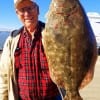 Bob Bilimek of Maud TX latched on to this 19inch flounder while fishing a Berkley Gulp