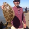 Briarcliff TX angler Stuart Yates took this 21inch doormat flounder on Berkley Gulp