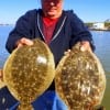 Dennis -The Menace- Boeker of High Island TX rounded up these two nice flounder on Berkley Gulp