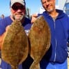 Fishin buds Chuck Scott and Mike Rice teamed up to catch these 18 and 20inch flounder while fishing a finger mullet and mud minnow