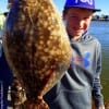 Grady Brewer of Dallas TX managed to take this nice 18inch flounder while fishing with shrimp