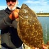 High Islander Jackie Bertolino hefts this nice 20inch flounder caught on a Berkley Gulp