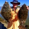 Michael Mathis of Houston nabbed these two nice flounder on Berkley Gulp