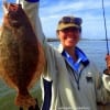 Ramona Hennigan of Huffman TX wrangled up this nice flounder while fishing a finger mullet