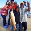The W-J-N Austin TX Fishing Krewe celebrate Ollie Nickols catch of this 30inch tagger bull red that he took on shrimp