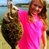 Young Riley Morton of Huntsville TX took this nice 19inch flounder on Berkley Gulp- Riley is a student at Montgomery Elementary