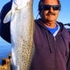 Catch and Release angler Don Kernan of Bolivar shows off his one of two specks, 5.5 and 6.7, caught on soft plastics