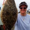 Diane Vickers of Pearland landed this nice TEXAS HALIBUT (flounder) while fishing a ghost minnow