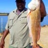 Brian Denton of Humble TX caught this nice 27inch slot red on a finger mullet