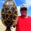 Felix Barker of Kountze TX nabbed this nice keeper flounder while dragging soft plastics along the bottom of Rollover Pass
