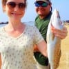 Jennifer Fielding and hubby from Baytown TX hefts this nice speckled trout caught on soft plastic