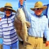 Rolly and Jonry Edralin of Sugarland TX show off dads (Rolly) drum catch he took on shrimp