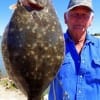This Tarkington Prairie angler fished a chartreuse gulp to nab this nice flounder