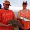 Dan and Tiffany Phillip of New Caney TX teamed up to catch this nice trout and flounder on live shrimp