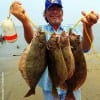 Galveston Islander Rick Talley waded the bay with berkley gulp to fetch this nice stringer of flounder