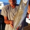 High Islander Jackie Bertolino threw a red and white Mirror Lure and caught this 25inch gator-speck on his first AM cast