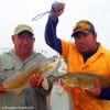 Houston Father and Son anglers Gustafo and Edgar Meza took these nice specks and flounder fishing finger mullet