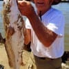 Hughey Singleton of Winnie TX caught and released this nice red he took on a finger mullet