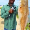 Roy Williams of Houston took this nice slot red while fishing with live shrimp