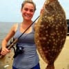 Sierra Thomson of Galveston took this nice flounder while fishing a finger mullet