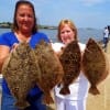 Sister anglers Terrie and Sharry Riley teamed up to nab these nice flounder they caught on berkley gulp