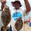 TWO AT A TIME for Karl Dever of Houston who fished berkley gulps for this double header of flounder