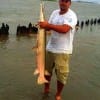 It took a toe to toe battle to reel in this 4ft- 60lb alligator gar that Jeff Dittich of Friendswood TX had to hand grab to land- Jeff caught the toothy critter on a live croaker