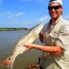 Taylor Thompson of Baytown TX nabbed this nice 26inch slot red while freelining live shrimp