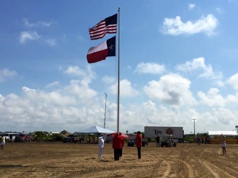 Old Glory was raised on Saturday morning to mark the start of the 2015 Texas Frog Fest in Crystal Beach. Facebook/TexasFrogFest
