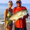 Chelsea Baker teamed up with Donnie Lucier to battle this 14 lb Jack Crevaile Donny caught in the surf on sugar and spice