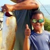 Father and Son team Larry Davis with 9yr old Larry JR took this nice 27inch slot red on live shrimp
