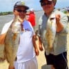 Fishin Buds Jeremy Phothis and Ellish Vilaboud of Houston teamed up to catch these 2 nice trout on TX Chickens