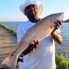 Lawrence Britton of Houston took this slot red while fishing shrimp