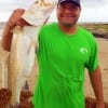 Luis Cervantes of Baytown TX waded the AM surf with a Texas Chicken mirrOlure to catch this really nice 27inch- 6.12 lb gator-trout