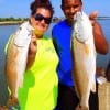 Newton TX anglers Jennifer and McCoy Franks display thier nice reds they caught on cut bait