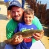 Proud Daddy Miller shows off his son's nice speck that Caden took on finger mullet