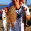 Rollover Fishing Team Jason and Bobbi Darcy fished live shad for these nice trout and flounder