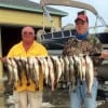 Rollover Fishing pals Terry Weir and Bill Taylor drifted East Bay waters with live shrimp to fetch this ALMOST 2 man trout limit caught on live shrimp