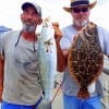 Rollover anglers Capt Jack and Alton Thorpe took these flounder and trout on finger mullet