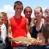 The Broom Family of Colmesneil TX  show off thier days catch of bluefish, redfish, and flounder