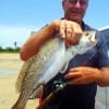 Working a T-28 mirrOlure in the cut caught this nice speck for Chuck Meyers of Gilchrist TX