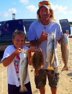 A BIG TEXAS SLAM goes to father and son fishing team Jaden and Scott Harper of Leesburgh TX for their trout, flounder, and redfish catch