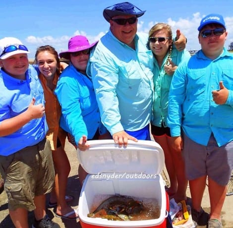 Atlanta TX anglers, the Primrose Family, had fun at Rollover loading this cooler of trout and crabs for their family day