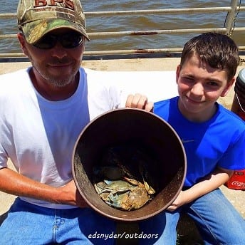 ChannelView TX Father and son crabbin team gave the Wildman's a bucket full of claws after baiting with cut mullet