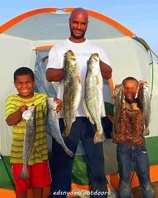 Jace and J'sean Hayes helped daddy Hayes with these nice specks which included  26 and 27 inch gators caught on Hogan-Rs