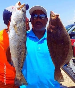 Karl -got the net- Ray of Houston nabbed these nice trout and flounder on berkley gulp