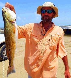 Kayaker Greg Ellingson of Huffman TX fished Rollover Bay with a MirrOlure soft plastic to nab this 27inch slot red