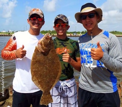 The Three Musketeer Fishing Krewe teamed up to catch this 20inch doormat flounder on Miss Nancy's shrimp